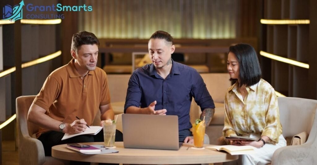 Professional grant writing desk showing successful proposal strategies and funding requirements - insights from The Empowerment Center's 80% success rate in Cleveland